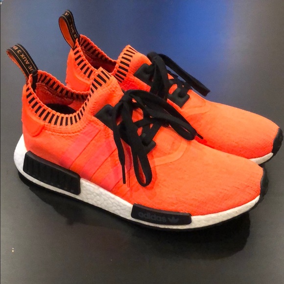 nmd r1 orange noise